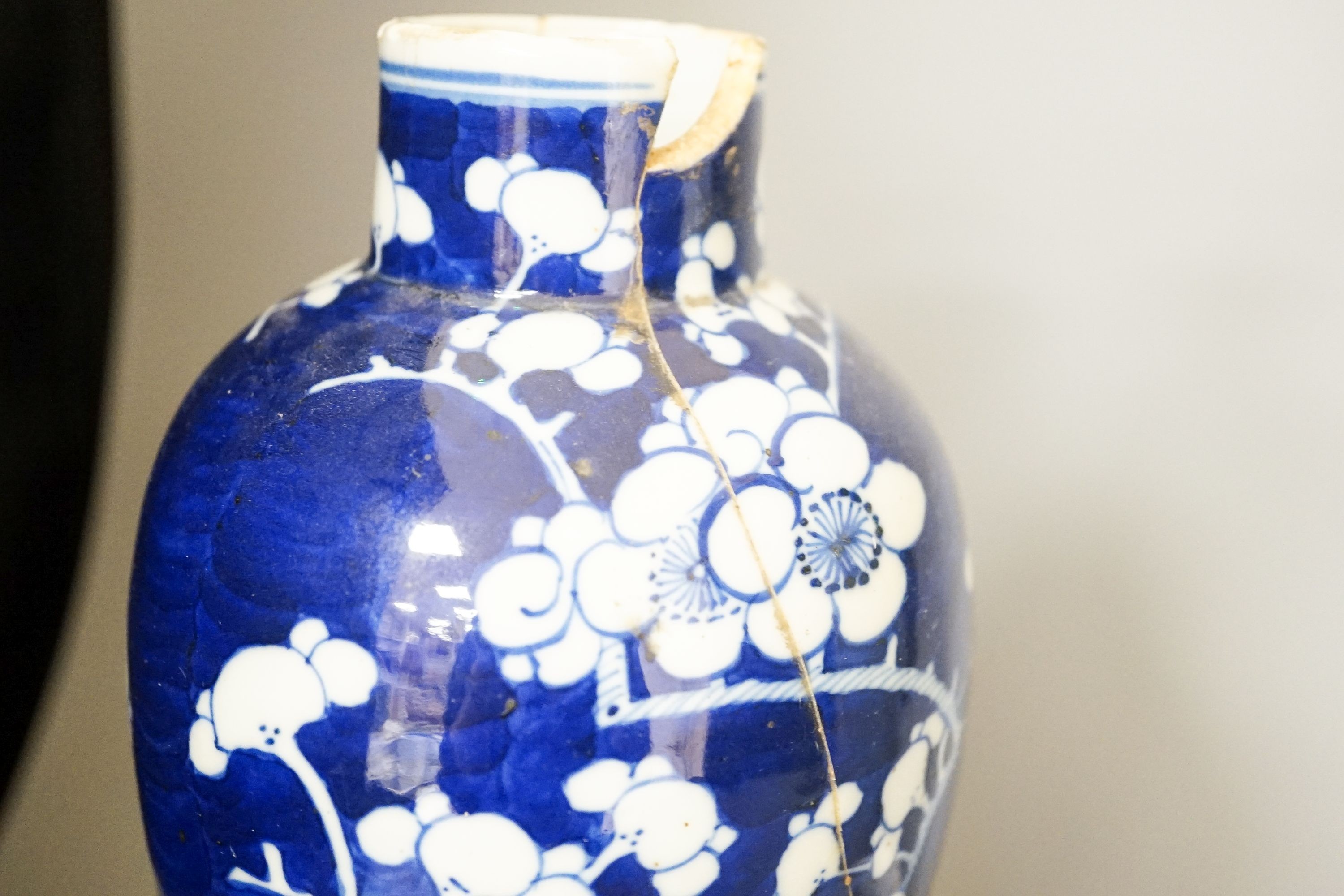 Two Chinese blue and white vases and a slender crackle glaze vase, Qing and later 30cm